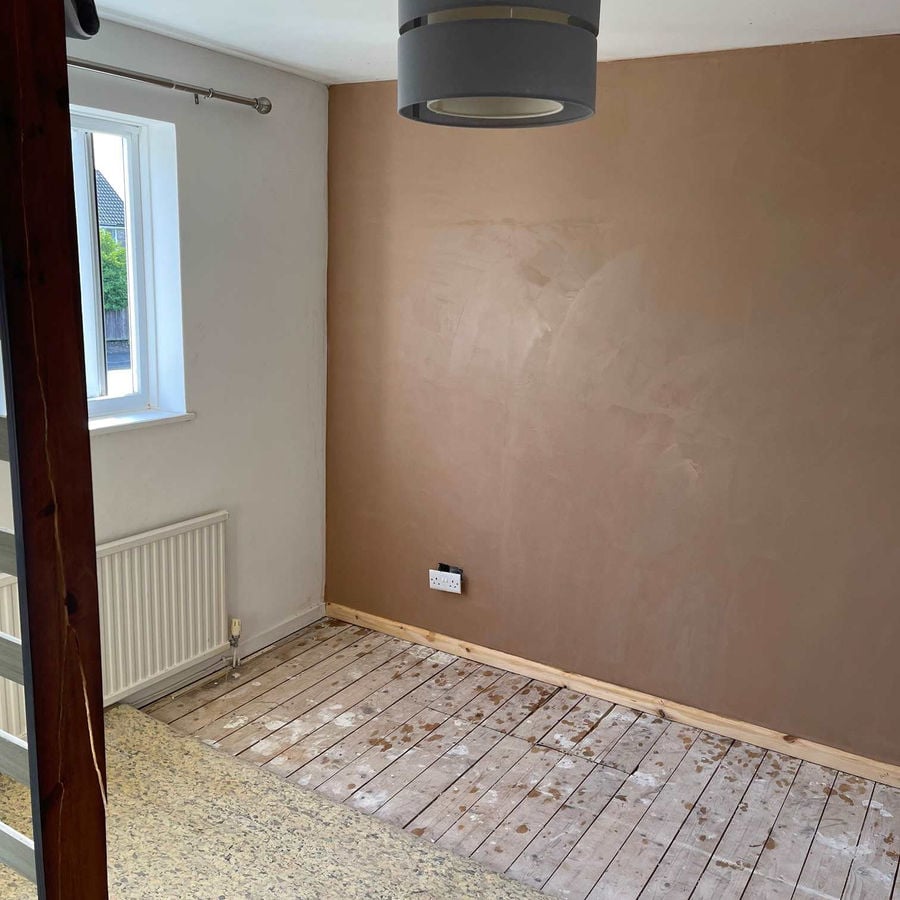 The same style of wall replastered and finished after treatment