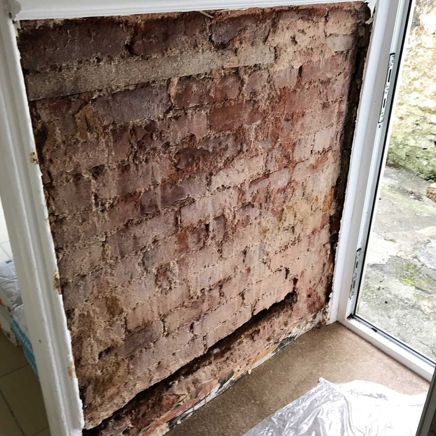 Exposed brick wall prepared for tanking